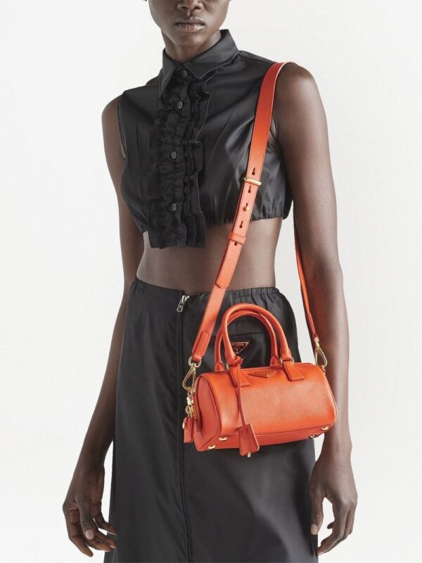 Prada triangle-plaque leather mini bag - Image 2