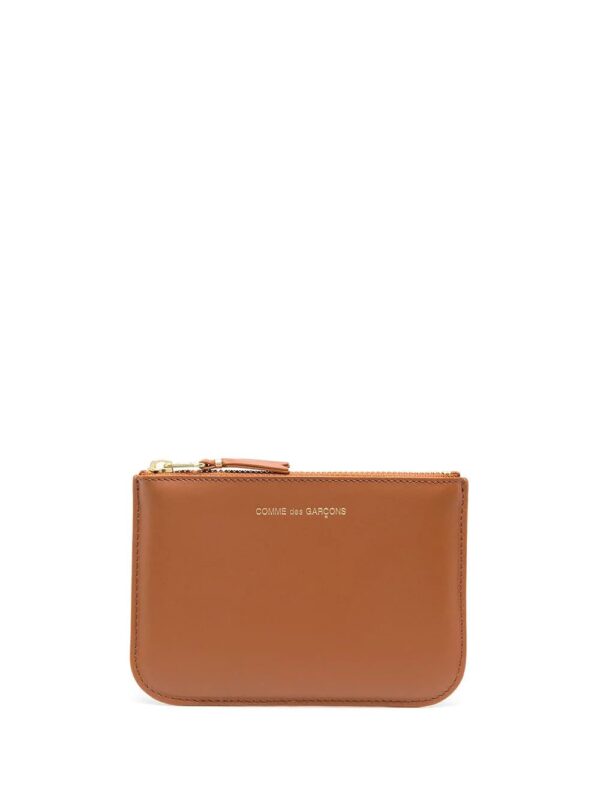 Comme Des Garçons Wallet  Ruby Eye zipped wallet