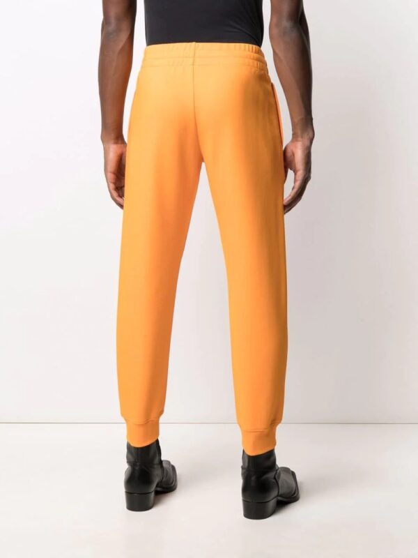 Moschino  logo-print track pants - Image 4