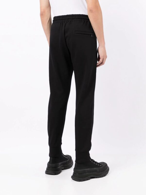 Dolce & Gabbana  crest-embroidered track pants - Image 4