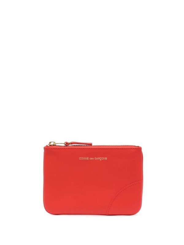 Comme Des Garçons Wallet  engraved-logo wallet