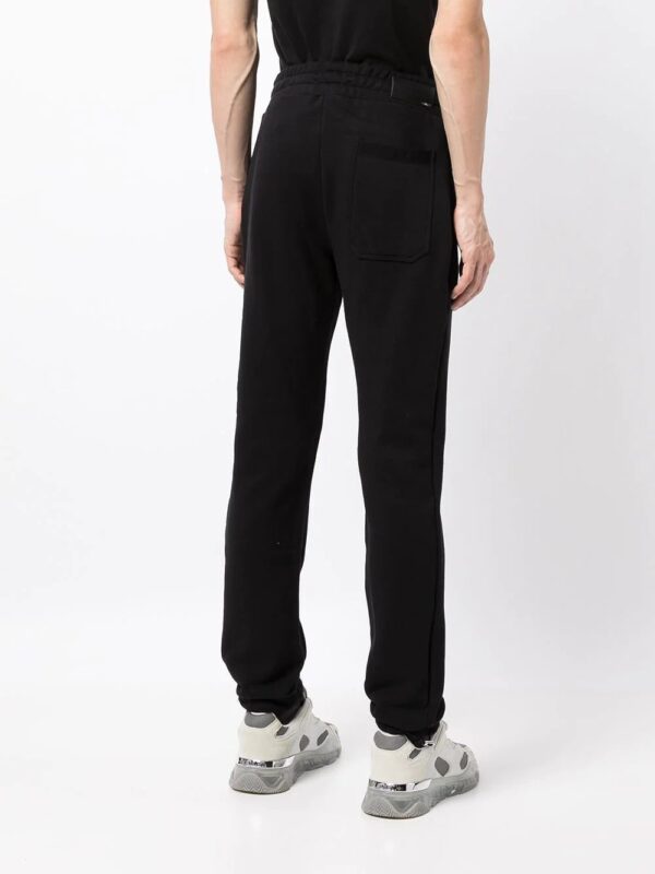 AMIRI  logo-print track pants - Image 4