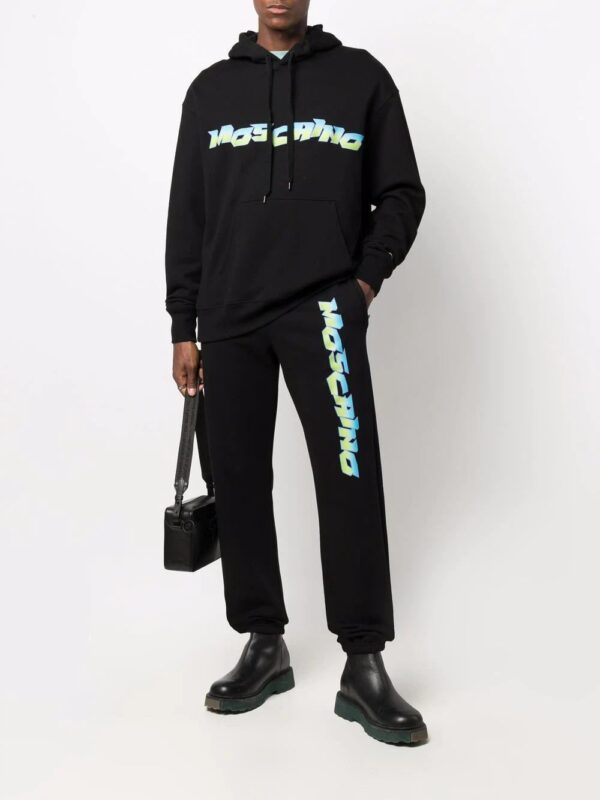 Moschino  logo-print track pants - Image 2