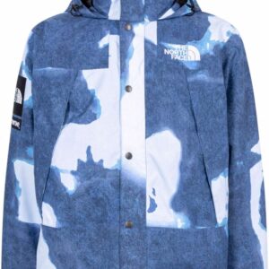 Supreme  x The North Face bleached denim-print mountain jacket