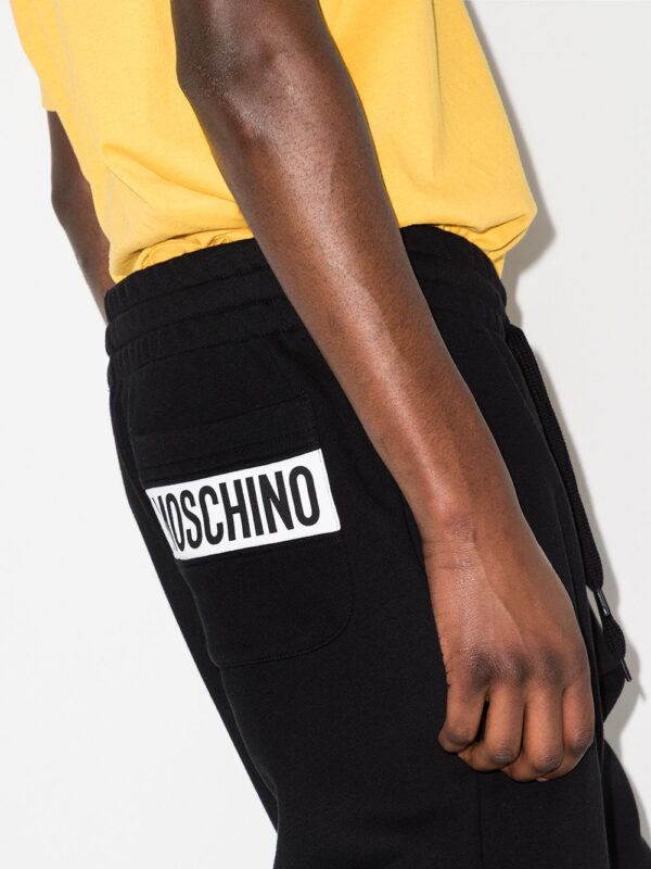 Moschino  logo-patch track pants - Image 4