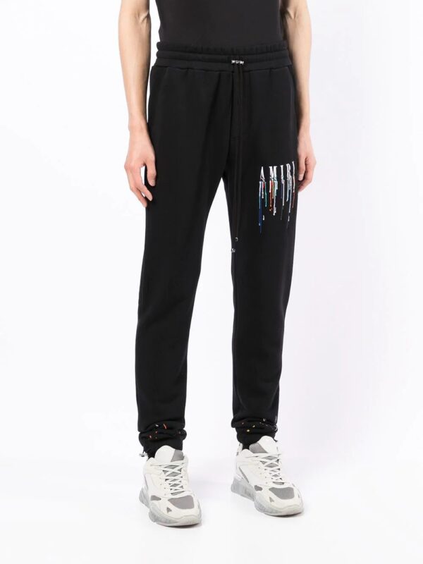 AMIRI  paint-drip logo track pants - Image 3