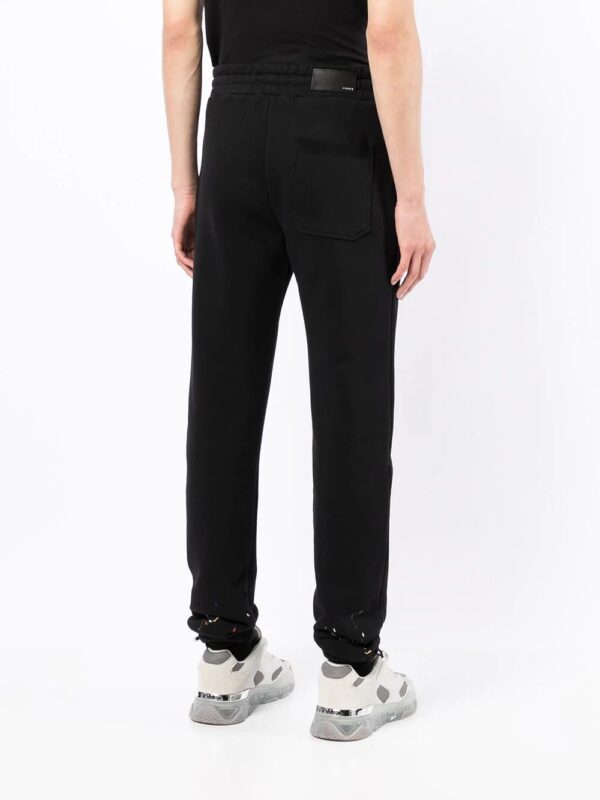 AMIRI  paint-drip logo track pants - Image 4