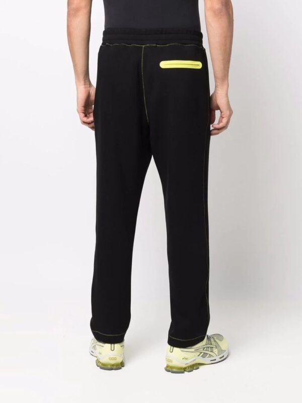 Moschino  logo-print track pants - Image 4