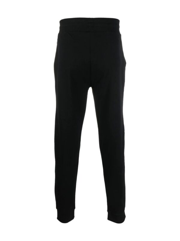 Moschino  logo-print track pants - Image 2