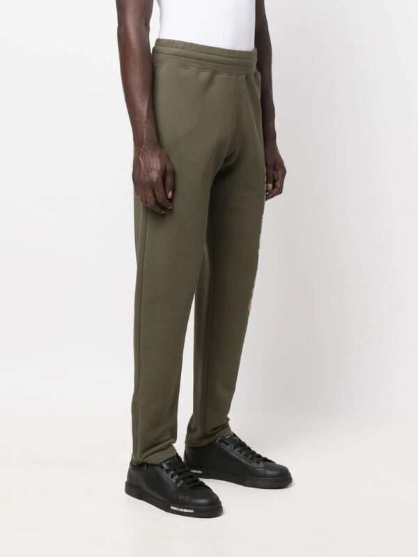Moschino  logo-print track pants - Image 3