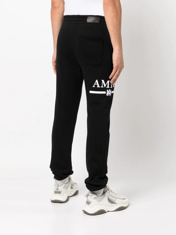 AMIRI  logo print track pants - Image 4