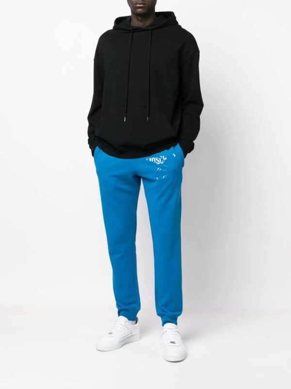 Moschino  logo-print track pants - Image 2