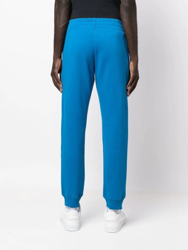 Moschino  logo-print track pants - Image 4
