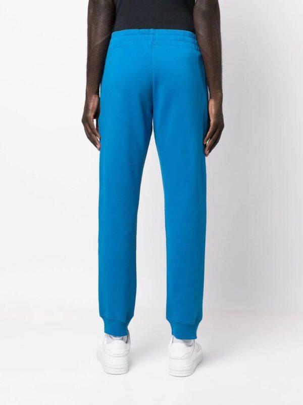 Moschino  logo-print track pants - Image 4