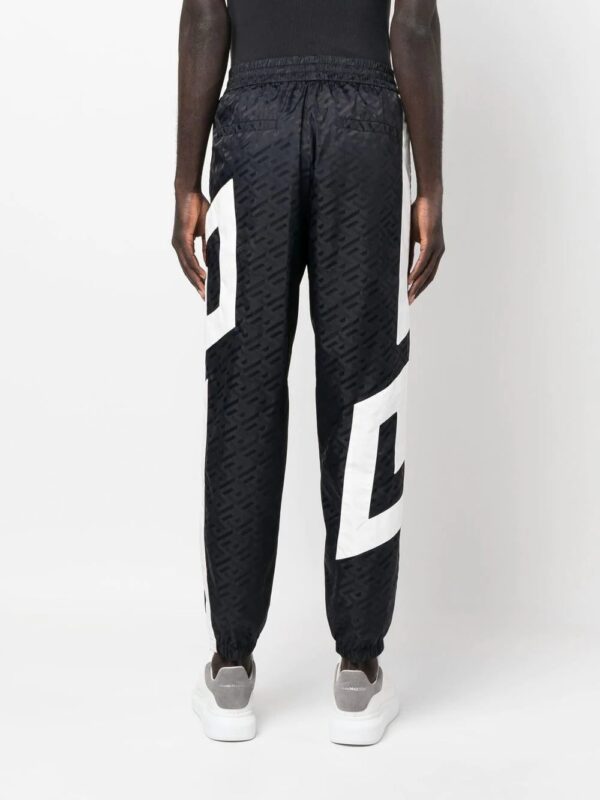 Versace  logo-print track pants - Image 4