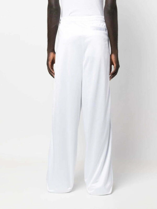 VETEMENTS  logo-patch track pants - Image 4