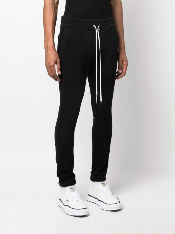 AMIRI  logo-embroidered track pants - Image 3