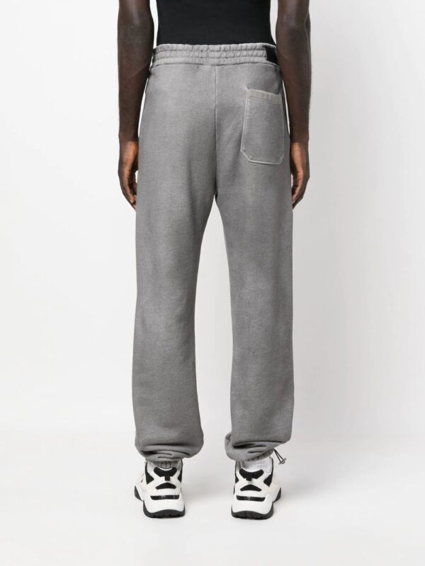 AMIRI  logo-embroidered track pants - Image 4