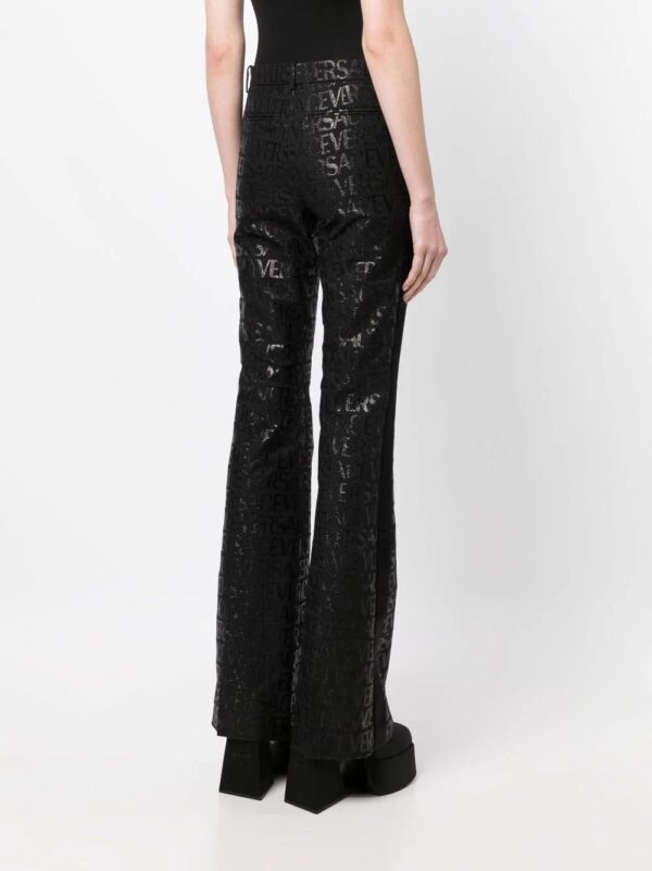 Versace  logo-jacquard flared-leg trousers - Image 4