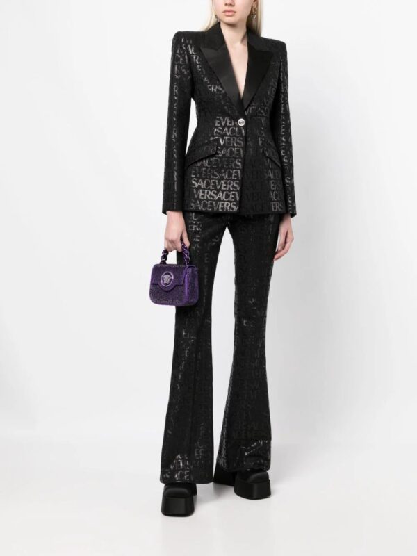 Versace  logo-jacquard flared-leg trousers - Image 2