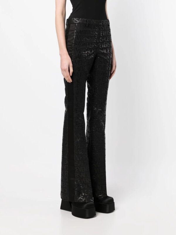 Versace  logo-jacquard flared-leg trousers - Image 3