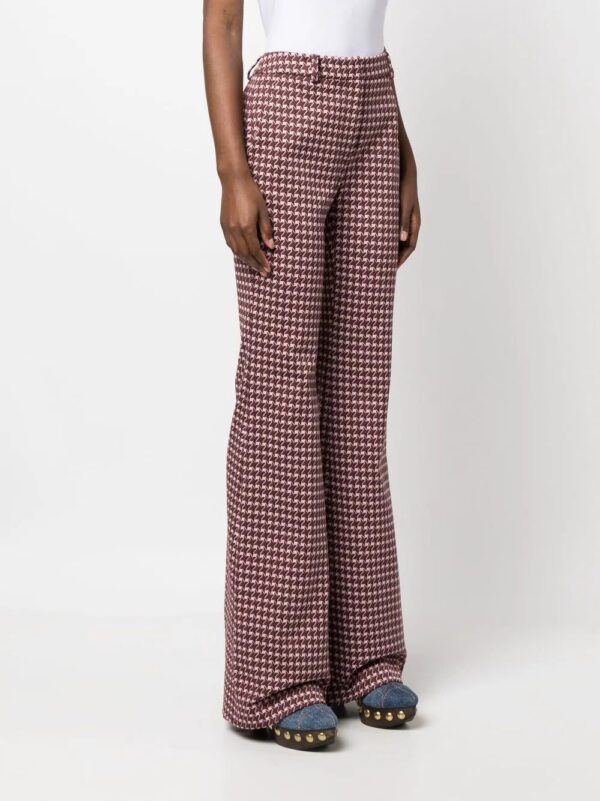 Moschino  graphic-print flared trousers - Image 3