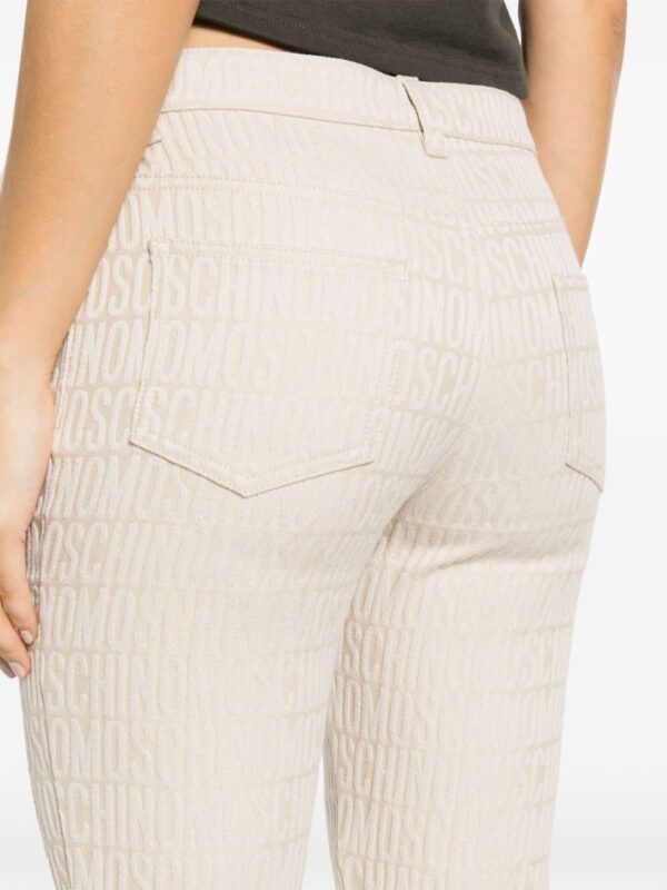 Moschino  logo-print cotton-blend tapered trousers - Image 4