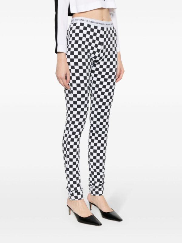 Moschino  checkerboard-print flared trousers - Image 3