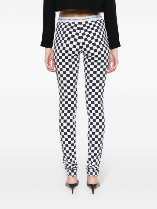 Moschino  checkerboard-print flared trousers - Image 4