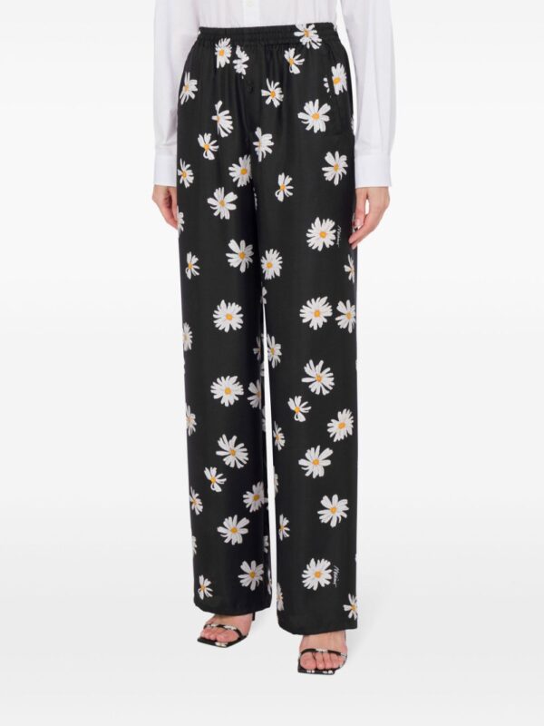 Moschino  daisy-print trousers - Image 2