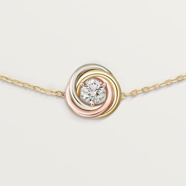 Cartier Trinity bracelet, on chain, 1 diamond