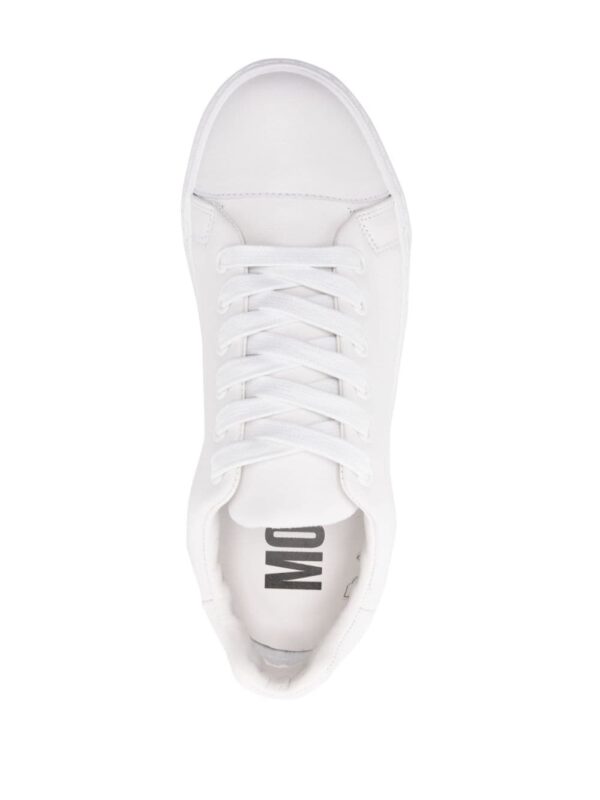 Moschino logo-embossed leather sneakers - Image 4