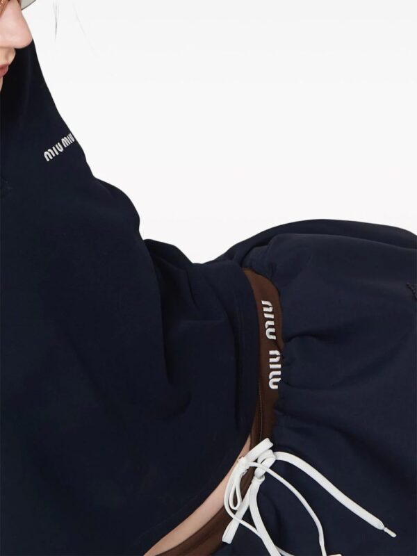 Miu Miu  logo-appliqué wool miniskirt - Image 3